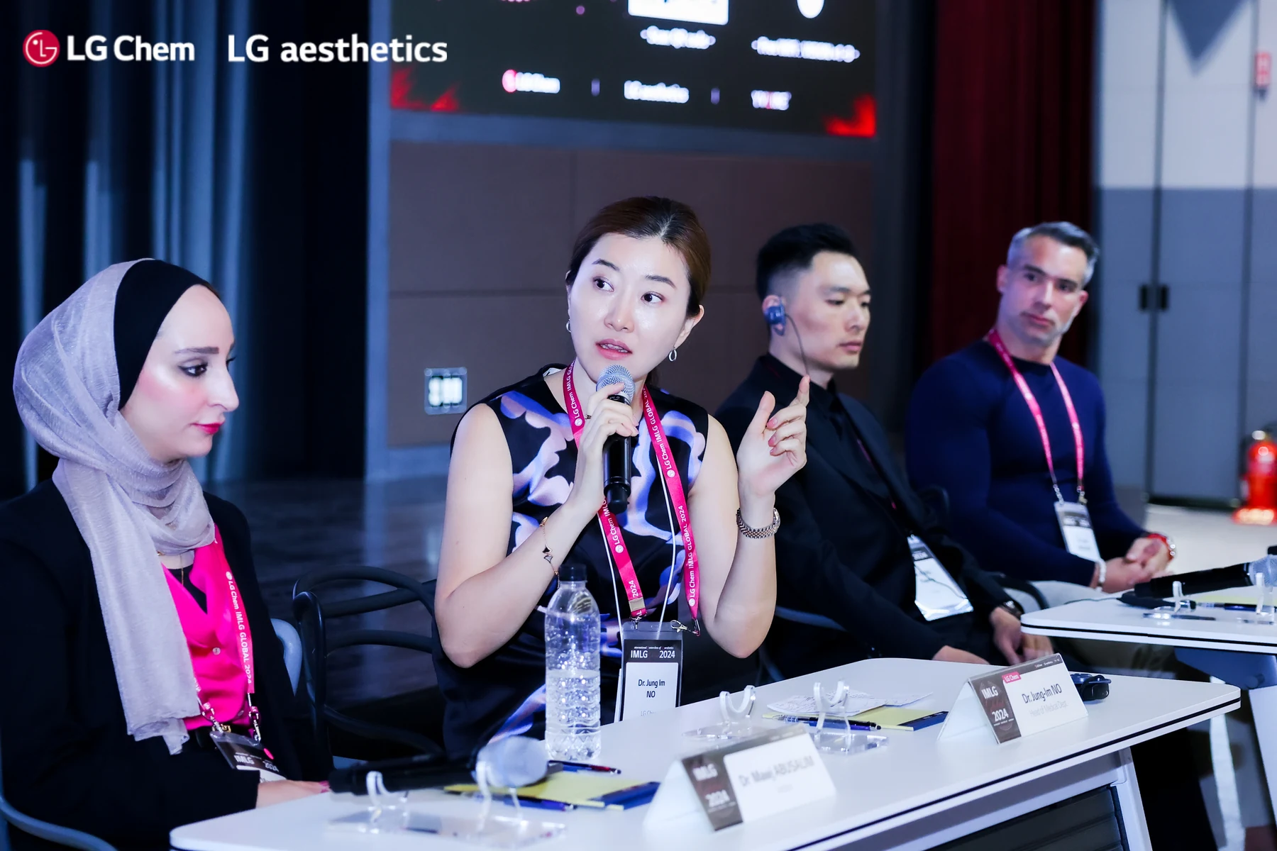 Dr. Jung Im No speaking on an international aesthetics panel in 2024