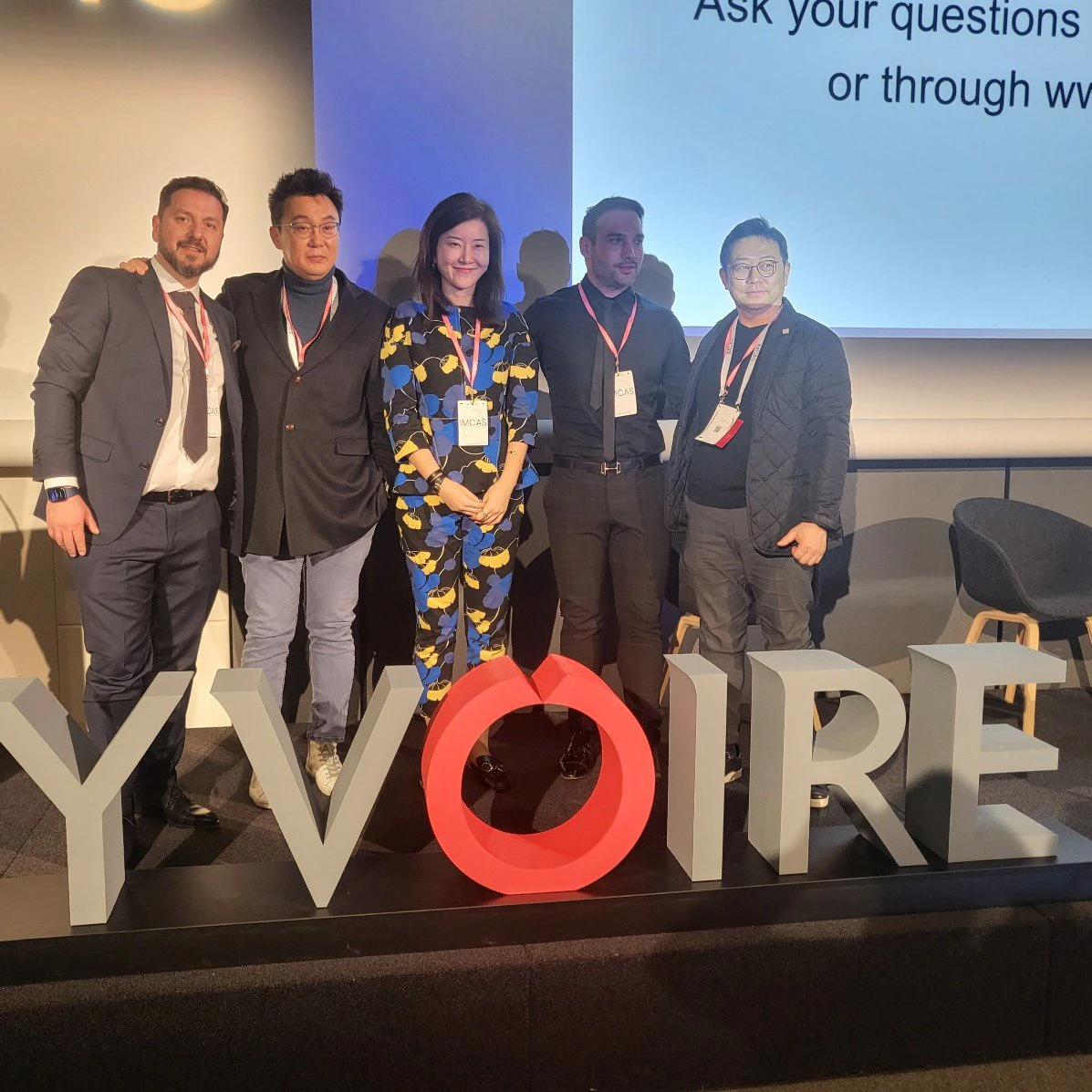 Dr. Jung Im No with international faculty at an aesthetics congress